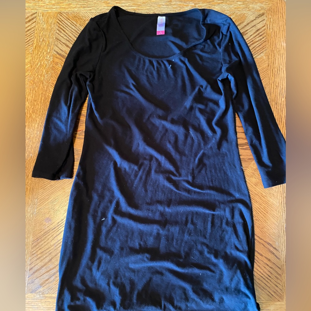 Black mini dress with low neckline and elbow length sleeves medium
